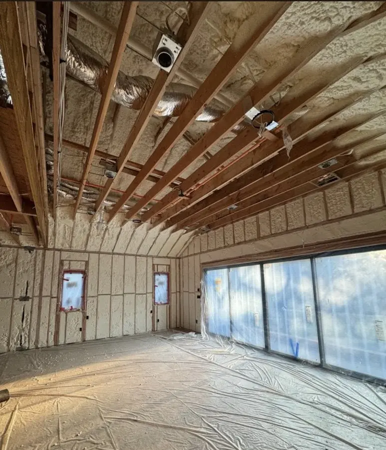 Interior walls and ceiling insulated with spray foam during new construction in Tifton